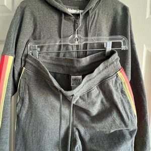 Adorable small track suit.  Bought at Lord & Taylor and worn once.